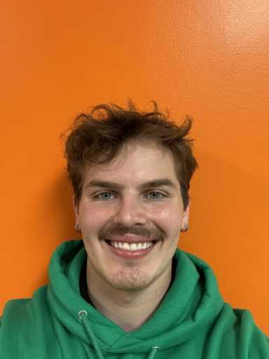Niko DeMichael headshot.